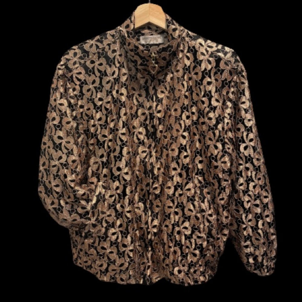 Vintage (80’s-ish) zip up jacket floral design